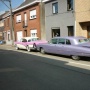 Buick Century 1957 en Cadillac Fleetwood limousine 1959